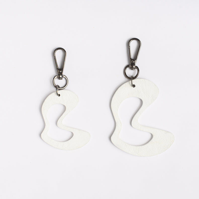 AGITATION WHITE TASSELS - siddhantagrawal
