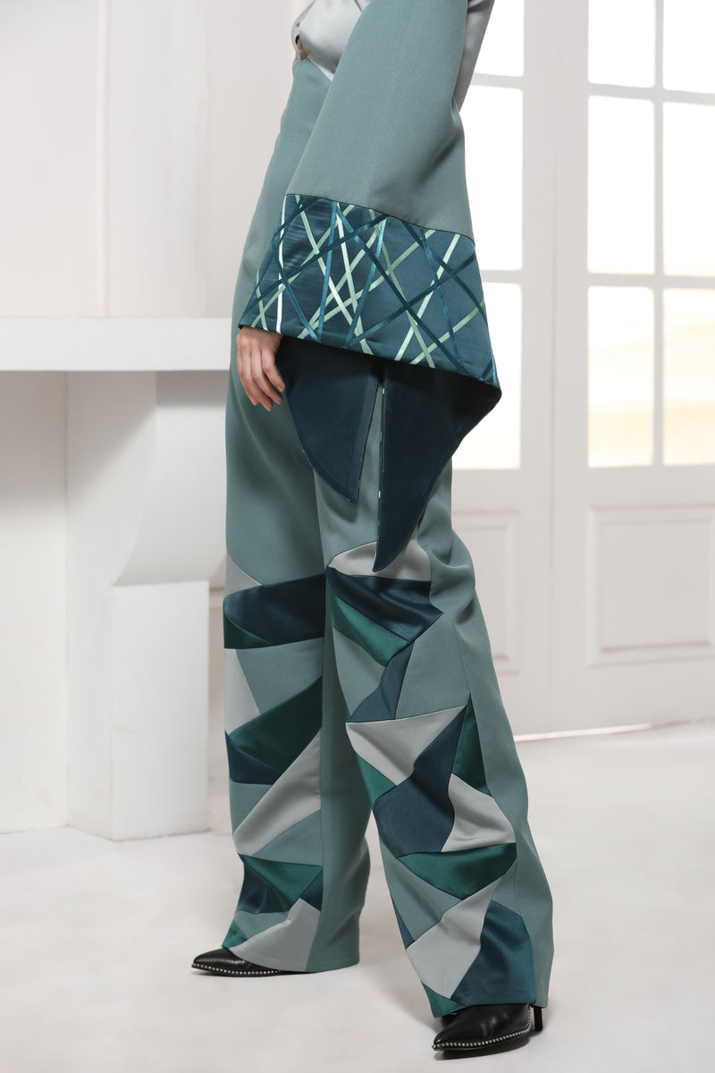 GREEN MONOTONE SATIN CREPE JUMPSUIT WITH ONE SIDE FLARED SATIN TEXTILE SLEEVE - siddhantagrawal